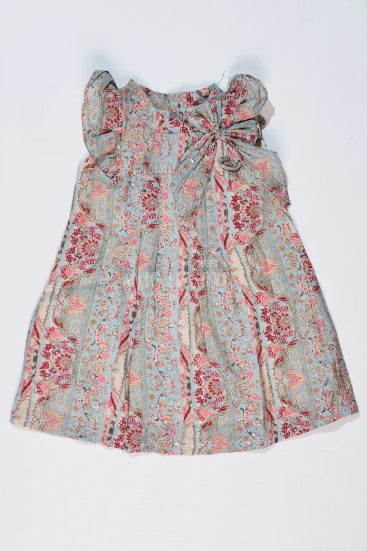 Girls Latest Frock in Muslin Silk with Intricate Print and Decorative Bow